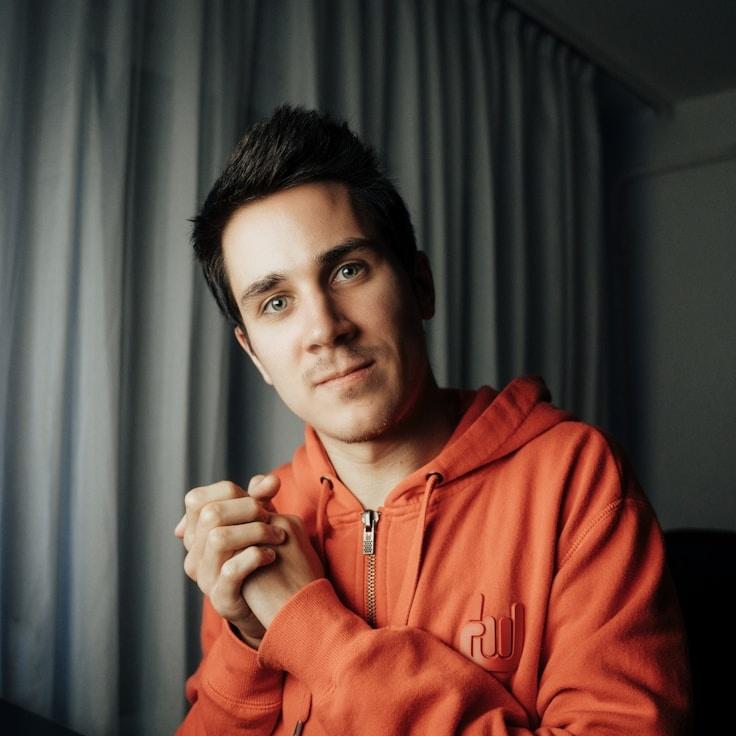 Milan Chen, Client Relations Director, discussing corporate gifting strategy with business clients